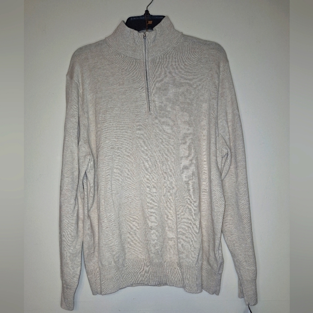 A J.Crew 100% cotton turtleneck sweater in a men's size large. EUC.